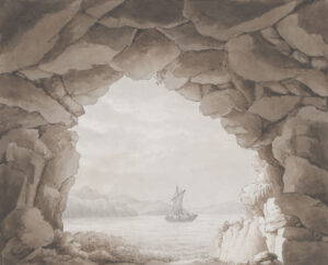 Blick aus einer Meeresgrotte auf ein Segelboot.