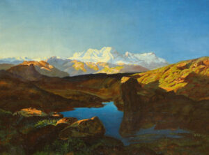 Alpenlandschaft mit Gebirgssee bei Sonnenaufgang.