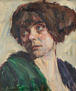 Brustbildnis einer braunhaarigen jungen Frau in grünem Kleid,