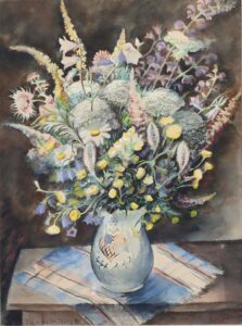 Blumenstilleben in gemusterter Vase.